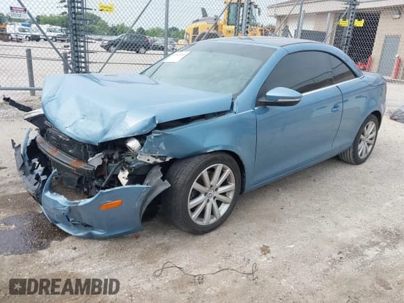 ✅ 2009 Volkswagen Eos Komfort • VIN: WVWBA71F89V023687 • Lot: 42443265. Listed on IAAI with 114,751 mi. Free auction sales archive from the USA and detailed vehicle history report at DreamBid. Image 2.