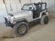 ✅ 2004 Jeep Wrangler Rubicon • VIN: 1J4FA69S14P758371 • Lot: 85557875. Wystawiony na Copart z przebiegiem 144 656 mil. Bezpłatny archiwum sprzedaży aukcyjnych z USA i szczegółowy raport historii pojazdu na DreamBid. Zdjęcie 1.