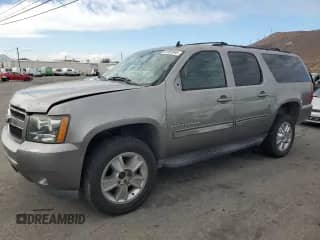 2009 Chevrolet Suburban 2LT z VIN 1GNFK26379R241605, wystawiony jako Copart lot #81592045 z przebiegiem Nie podano mil oraz Szkoda całkowita • Salvage title. Historia ofert i sprzedaży dostępna na DreamBid. Obrazek 1.