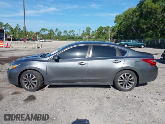 ✅ 2017 Nissan Altima SL • VIN: 1N4AL3AP7HC224844 • Lot: 42922722. Listed on IAAI with 163,041 mi. Free auction sales archive from the USA and detailed vehicle history report at DreamBid. Image 14.