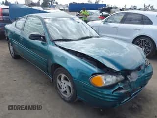 ✅ 1999 Pontiac Grand Am • VIN: 1G2NE12E4XM733780 • Lot: 43293217. Listed on IAAI with 123,754 mi. Free auction sales archive from the USA and detailed vehicle history report at DreamBid. Image 1.