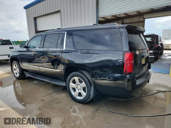 2015 Chevrolet Suburban LT с VIN 1GNSCJKCXFR243601, выставлен на аукционе Copart как лот 81587885 с пробегом 211 539 миль миль и Чистый • Clean title. История ставок и продаж доступна на DreamBid. Изображение 2.