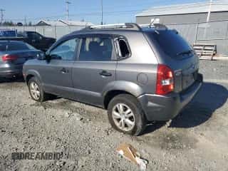 2009 Hyundai Tucson GLS z VIN KM8JM12B09U009571, wystawiony jako Copart lot #84885555 z przebiegiem 156 939 mil mil oraz Szkoda całkowita • Salvage title. Historia ofert i sprzedaży dostępna na DreamBid. Obrazek 2.