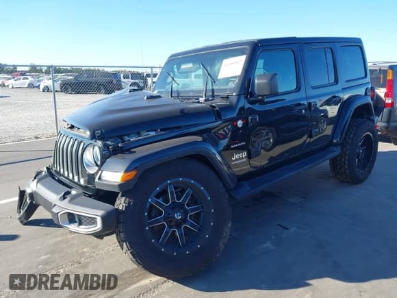 ✅ 2018 Jeep Wrangler Unlimited Sahara • VIN: 1C4HJXENXJW250860 • Lot: 43690907. Listed on IAAI with 79,756 mi. Free auction sales archive from the USA and detailed vehicle history report at DreamBid. Image 18.