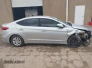 ✅ 2018 Hyundai Elantra SE • VIN: 5NPD74LF3JH347427 • Lot: 43482606. Listed on IAAI with 124,411 mi. Free auction sales archive from the USA and detailed vehicle history report at DreamBid. Image 14.