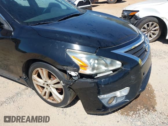 ✅ 2014 Nissan Altima SL • VIN: 1N4BL3AP7EC127871 • Лот: 43104239. Опубликован ранее на IAAI с пробегом 224 738 миль. Бесплатный доступ к архиву аукционных продаж из США и подробный отчёт об истории автомобиля на DreamBid. Изображение 12.