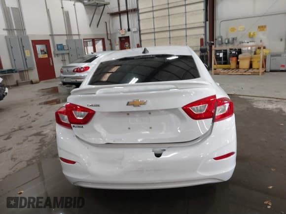 ✅ 2016 Chevrolet Cruze LS • VIN: 1G1BB5SMXG7272517 • Lot: 41283610. Listed on IAAI with 57,497 mi. Free auction sales archive from the USA and detailed vehicle history report at DreamBid. Image 16.