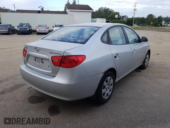 2007 Hyundai Elantra GLS z VIN KMHDU45D77U135130, wystawiony jako Copart lot #68727154 z przebiegiem 148 943 mil mil oraz Szkoda całkowita • Salvage title. Historia ofert i sprzedaży dostępna na DreamBid. Obrazek 3.