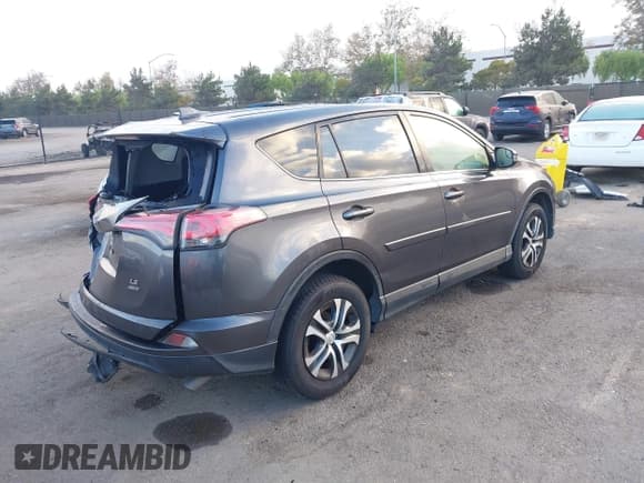 ✅ 2018 Toyota RAV4 LE • VIN: JTMBFREV1JJ734089 • Lot: 43487260. Listed on IAAI with 152,568 mi. Free auction sales archive from the USA and detailed vehicle history report at DreamBid. Image 4.