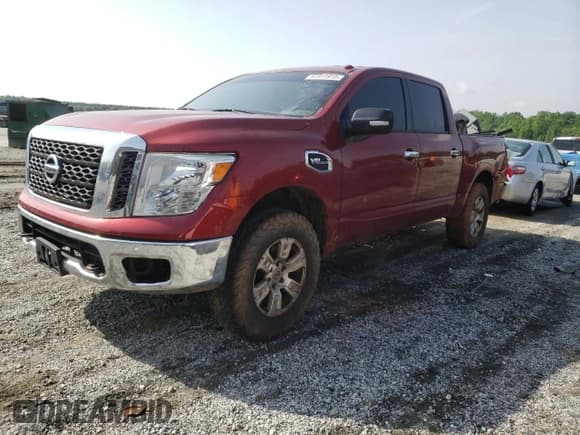 ✅ 2017 Nissan Titan SV • VIN: 1N6AA1EJ8HN573992 • Lot: 57311915. Listed on Copart with 216,138 mi. Free auction sales archive from the USA and detailed vehicle history report at DreamBid. Image 1.