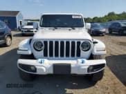 ✅ 2022 Jeep Wrangler Unlimited Sahara • VIN: 1C4JJXP61NW187161 • Лот: 64572865. Опубликован ранее на Copart с пробегом 48 198 миль. Бесплатный доступ к архиву аукционных продаж из США и подробный отчёт об истории автомобиля на DreamBid. Изображение 5.