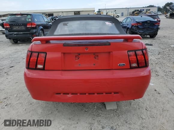 ✅ 2004 Ford Mustang Deluxe • VIN: 1FAFP44484F120440 • Lot: 80887355. Listed on Copart with 185,154 mi. Free auction sales archive from the USA and detailed vehicle history report at DreamBid. Image 6.