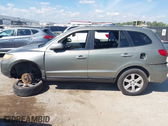 ✅ 2008 Hyundai Santa Fe SE • VIN: 5NMSH13E48H176897 • Lot: 43311941. Listed on IAAI with 196,763 mi. Free auction sales archive from the USA and detailed vehicle history report at DreamBid. Image 13.
