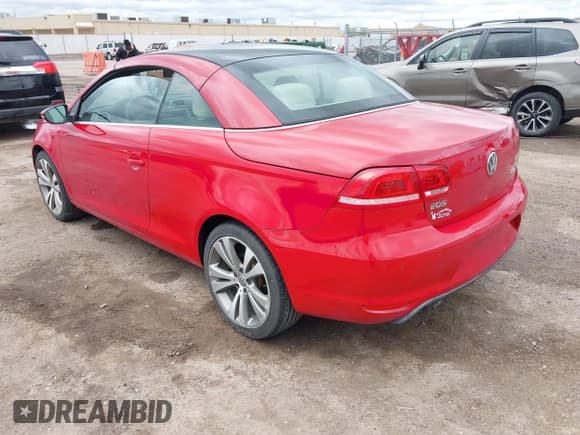 ✅ 2013 Volkswagen Eos Executive • VIN: WVWFW8AH5DV003044 • Lot: 41920847. Listed on IAAI with 114,566 mi. Free auction sales archive from the USA and detailed vehicle history report at DreamBid. Image 3.