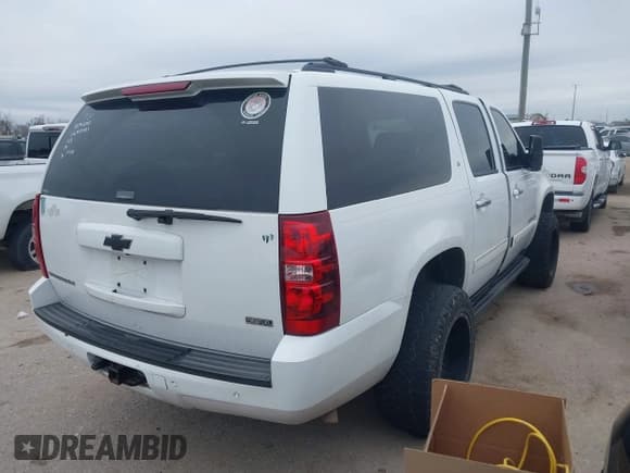 ✅ 2008 Chevrolet Suburban 3LT • VIN: 3GNFC16048G187823 • Lot: 41612832. Listed on IAAI with 244,128 mi. Free auction sales archive from the USA and detailed vehicle history report at DreamBid. Image 4.