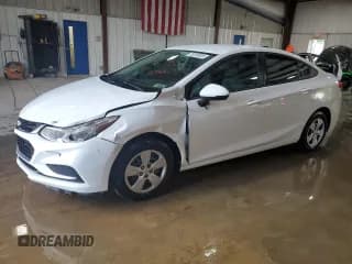 ✅ 2018 Chevrolet Cruze LS • VIN: 1G1BB5SM8J7197016 • Lot: 70255035. Listed on Copart with 70,163 mi. Free auction sales archive from the USA and detailed vehicle history report at DreamBid. Image 1.