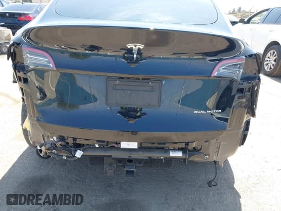 ✅ 2023 Tesla Model Y Long Range • VIN: 7SAYGDEE0PA023719 • Lot: 41974415. Listed on IAAI with 50,152 mi. Free auction sales archive from the USA and detailed vehicle history report at DreamBid. Image 6.