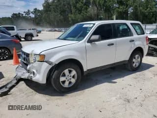 ✅ 2009 Ford Escape XLS • VIN: 1FMCU02729KA38273 • Lot: 71181785. Listed on Copart with 97,231 mi. Free auction sales archive from the USA and detailed vehicle history report at DreamBid. Image 1.