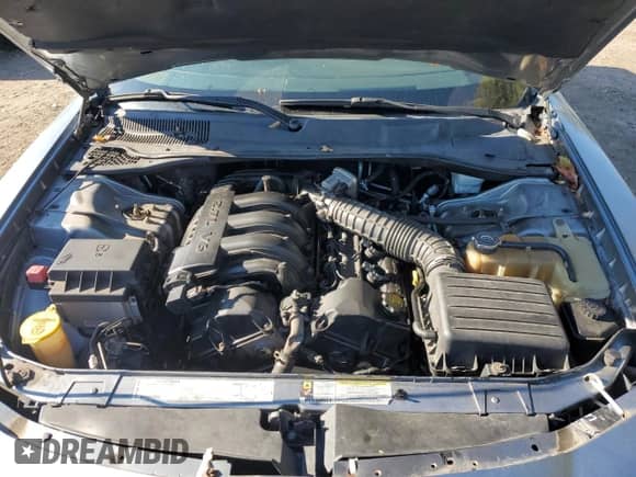 2007 Dodge Charger z VIN 2B3KA43RX7H621552, wystawiony jako Copart lot #86513765 z przebiegiem 154 731 mil mil oraz Szkoda całkowita • Salvage title. Historia ofert i sprzedaży dostępna na DreamBid. Obrazek 11.