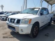 ✅ 2005 Nissan Titan LE • VIN: 1N6AA07BX5N573584 • Lot: 42709369. Listed on IAAI with 221,492 mi. Free auction sales archive from the USA and detailed vehicle history report at DreamBid. Image 2.