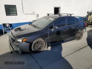 ✅ 2015 Subaru WRX STI • VIN: JF1VA2P6XF9805586 • Lot: 77472764. Listed on Copart with 153,116 mi. Free auction sales archive from the USA and detailed vehicle history report at DreamBid. Image 1.