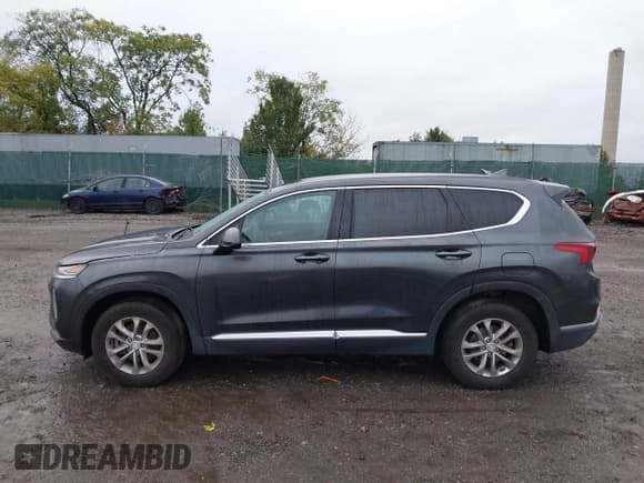 ✅ 2020 Hyundai Santa Fe SEL • VIN: 5NMS3CAD4LH202833 • Лот: 43434662. Опубликован ранее на IAAI с пробегом 76 924 миль. Бесплатный доступ к архиву аукционных продаж из США и подробный отчёт об истории автомобиля на DreamBid. Изображение 14.