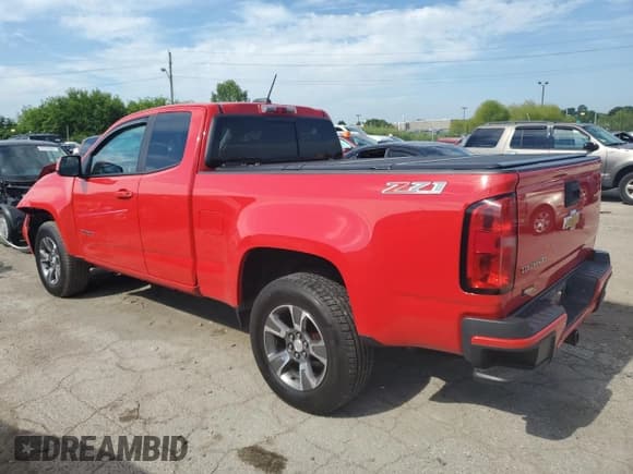✅ 2015 Chevrolet Colorado 4WD Z71 • VIN: 1GCHTCEA3F1245374 • Лот: 61809584. Опубликован ранее на Copart с пробегом 138 732 миль. Бесплатный доступ к архиву аукционных продаж из США и подробный отчёт об истории автомобиля на DreamBid. Изображение 2.
