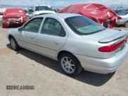 ✅ 2000 Ford Contour SE Fleet • VIN: 1FAFP66L8YK131192 • Lot: 42934038. Wystawiony na IAAI z przebiegiem 85 246 mil. Bezpłatny archiwum sprzedaży aukcyjnych z USA i szczegółowy raport historii pojazdu na DreamBid. Zdjęcie 3.