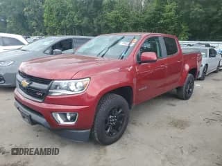 ✅ 2020 Chevrolet Colorado 4WD Z71 • VIN: 1GCGTDEN1L1164096 • Lot: 70562065. Listed on Copart with 75,550 mi. Free auction sales archive from the USA and detailed vehicle history report at DreamBid. Image 1.