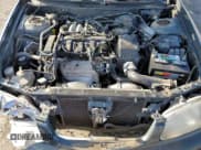 ✅ 2002 Mazda 626 LX • VIN: 1YVGF22C625265716 • Лот: 57782315. Опубликован ранее на Copart с пробегом 149 002 миль. Бесплатный доступ к архиву аукционных продаж из США и подробный отчёт об истории автомобиля на DreamBid. Изображение 11.