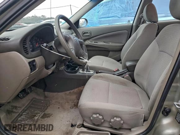 ✅ 2004 Nissan Sentra • VIN: 3N1CB51D74L877067 • Lot: 89630955. Wystawiony na Copart z przebiegiem 141 237 mil. Bezpłatny archiwum sprzedaży aukcyjnych z USA i szczegółowy raport historii pojazdu na DreamBid. Zdjęcie 7.