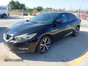 ✅ 2016 Nissan Maxima S • VIN: 1N4AA6APXGC421867 • Лот: 43381682. Опубликован ранее на IAAI с пробегом 124 092 миль. Бесплатный доступ к архиву аукционных продаж из США и подробный отчёт об истории автомобиля на DreamBid. Изображение 21.
