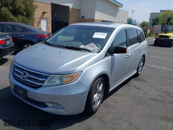 ✅ 2012 Honda Odyssey Touring • VIN: 5FNRL5H91CB004546 • Lot: 42175002. Listed on IAAI with 118,719 mi. Free auction sales archive from the USA and detailed vehicle history report at DreamBid. Image 19.