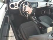 ✅ 2015 Volkswagen Beetle 1.8T • VIN: 3VW517AT0FM820912 • Лот: 68193595. Опубликован ранее на Copart с пробегом 49 198 миль. Бесплатный доступ к архиву аукционных продаж из США и подробный отчёт об истории автомобиля на DreamBid. Изображение 8.