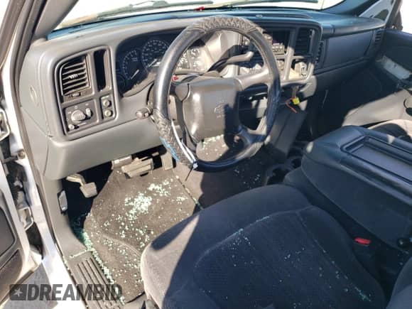 2002 Chevrolet Silverado 1500 LS with VIN 1GCEC14V72Z341127, listed as a Copart auction lot 56264674 with 306,494 mi miles and Salvage title. Bid and sale history available at DreamBid. Image 8.