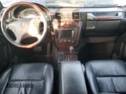 ✅ 2002 Mercedes-Benz G 500 • VIN: WDCYR49E72X133986 • Lot: 44765245. Listed on Copart with 138,580 mi. Free auction sales archive from the USA and detailed vehicle history report at DreamBid. Image 8.