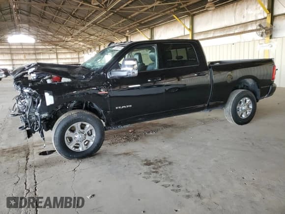✅ 2023 Ram 2500 Laramie • VIN: 3C6UR5FL4PG580565 • Lot: 42385155. Wystawiony na Copart z przebiegiem 13 939 mil. Bezpłatny archiwum sprzedaży aukcyjnych z USA i szczegółowy raport historii pojazdu na DreamBid. Zdjęcie 1.