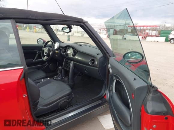 ✅ 2006 MINI Convertible • VIN: WMWRF33516TG14383 • Lot: 43716738. Listed on IAAI with 153,259 mi. Free auction sales archive from the USA and detailed vehicle history report at DreamBid. Image 5.