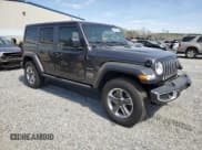 ✅ 2022 Jeep Wrangler Unlimited Sahara • VIN: 1C4HJXEG2NW190144 • Lot: 50055255. Listed on Copart with 48,277 mi. Free auction sales archive from the USA and detailed vehicle history report at DreamBid. Image 4.