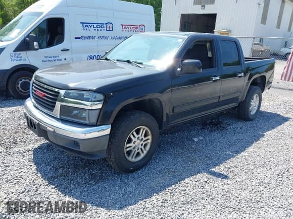 ✅ 2012 GMC Canyon SLE1 • VIN: 1GTH6MFE5C8118370 • Lot: 42861727. Listed on IAAI with 152,785 mi. Free auction sales archive from the USA and detailed vehicle history report at DreamBid. Image 2.
