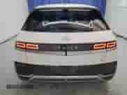 2024 Hyundai Ioniq 5 SEL z VIN KM8KNDDF6RU274160, wystawiony jako Copart lot #76762754 z przebiegiem 6 905 mil mil oraz Czysty tytuł • Clean title. Historia ofert i sprzedaży dostępna na DreamBid. Obrazek 6.