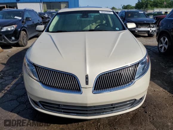 ✅ 2015 Lincoln MKS • VIN: 1LNHL9DK4FG607945 • Lot: 59343945. Wystawiony na Copart z przebiegiem 101 878 mil. Bezpłatny archiwum sprzedaży aukcyjnych z USA i szczegółowy raport historii pojazdu na DreamBid. Zdjęcie 5.