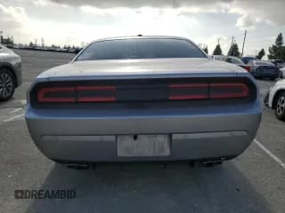 ✅ 2014 Dodge Challenger SXT • VIN: 2C3CDYAG1EH101194 • Lot: 84743424. Wystawiony na Copart z przebiegiem 135 233 mil. Bezpłatny archiwum sprzedaży aukcyjnych z USA i szczegółowy raport historii pojazdu na DreamBid. Zdjęcie 6.