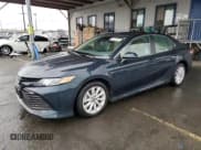 ✅ 2019 Toyota Camry LE • VIN: 4T1B11HK6KU844360 • Лот: 82501045. Опубликован ранее на Copart с пробегом 24 352 миль. Бесплатный доступ к архиву аукционных продаж из США и подробный отчёт об истории автомобиля на DreamBid. Изображение 1.