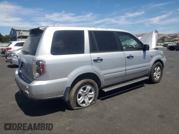 2006 Honda Pilot LX with VIN 2HKYF18136H556660, listed as a Copart auction lot 67755065 with 122,936 mi miles and Salvage title. Bid and sale history available at DreamBid. Image 3.