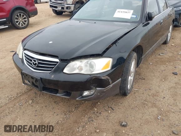 ✅ 2001 Mazda Millenia • VIN: JM1TA221711710228 • Lot: 41435837. Listed on IAAI with 152,445 mi. Free auction sales archive from the USA and detailed vehicle history report at DreamBid. Image 6.