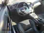 2010 Hyundai Genesis Coupe Grand Touring с VIN KMHHU6KH4AU011313, выставлен на аукционе Copart как лот 81179054 с пробегом 81 085 миль миль и Списание • Salvage title. История ставок и продаж доступна на DreamBid. Изображение 8.