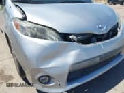 ✅ 2014 Toyota Sienna SE • VIN: 5TDXK3DC4ES491269 • Lot: 42004485. Listed on IAAI with 118,516 mi. Free auction sales archive from the USA and detailed vehicle history report at DreamBid. Image 6.