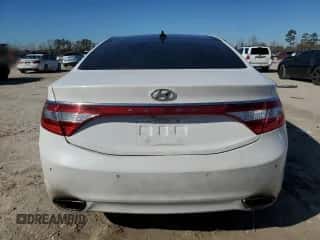 2013 Hyundai Azera с VIN KMHFH4JG3DA224834, выставлен на аукционе Copart как лот 42103125 с пробегом 149 368 миль миль и Списание • Salvage title. История ставок и продаж доступна на DreamBid. Изображение 6.