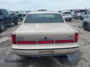 ✅ 1997 Lincoln Town Car Signature • VIN: 1LNLM82W9VY742564 • Lot: 42338729. Listed on IAAI with 206,178 mi. Free auction sales archive from the USA and detailed vehicle history report at DreamBid. Image 16.